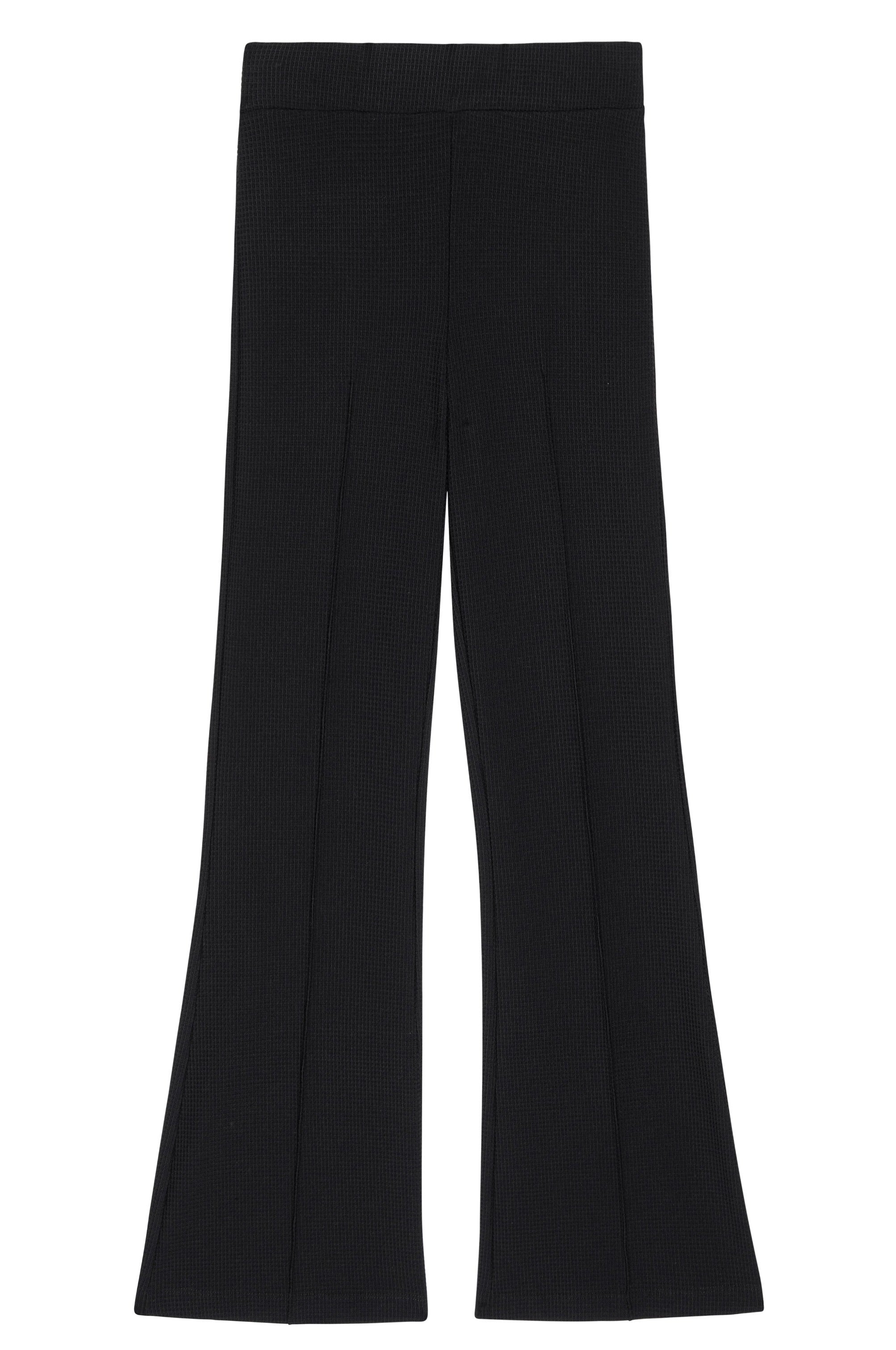 A pair of Donni The Box Weave Stretch Kick Flare pants by Donni, featuring a high-waisted, flared design in a jet black color. Made from textured, rib-knit fabric, these pants include a wide waistband and vertical seams down the front of each leg.