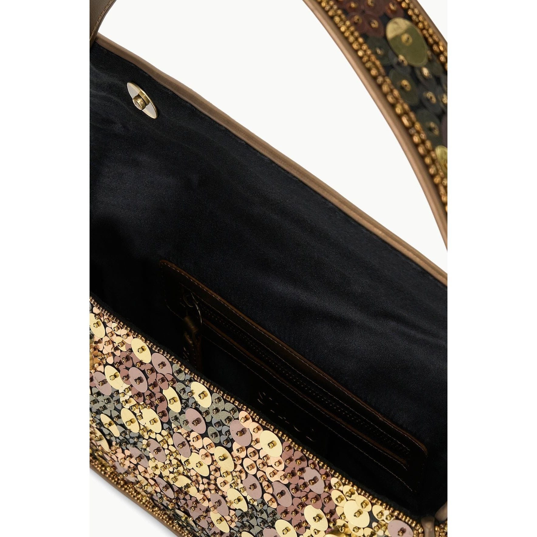 The Staud Tommy Bag in Gilded Sequins features an open design with a black interior, adorned with a gold clasp. The outer flap is embellished with an exquisite floral pattern made of sequins in gold, pink, and bronze hues. Crafted from vegan leather by Staud, this bag beautifully blends elegance and sustainability.