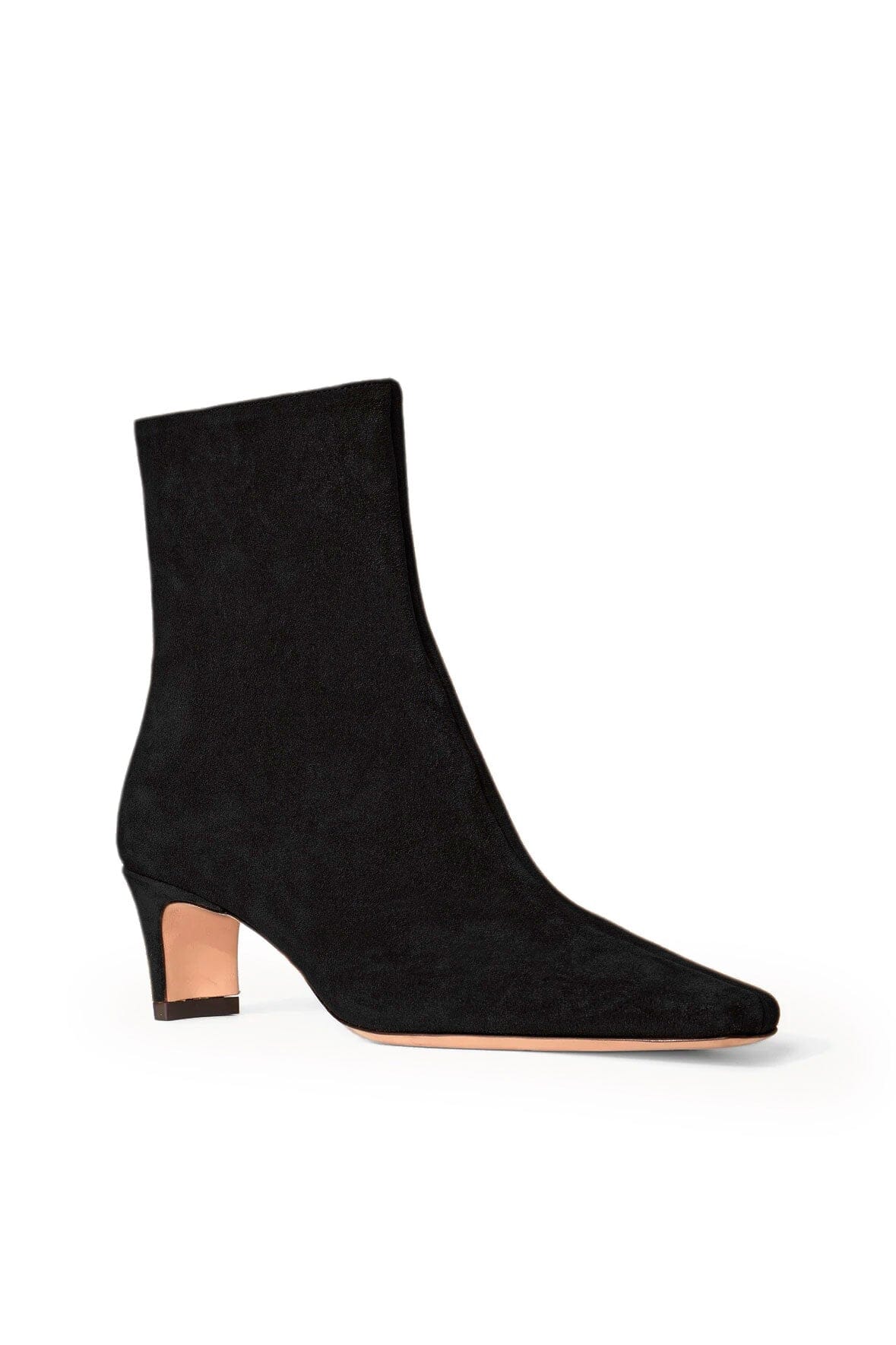 The Staud Western Wally Ankle Boot in black suede showcases a sleek, minimalist design with a slightly pointed toe and squared, low heel. The tan-colored sole adds a subtle contrast against the plain white background, perfectly blending modern elegance with classic charm.